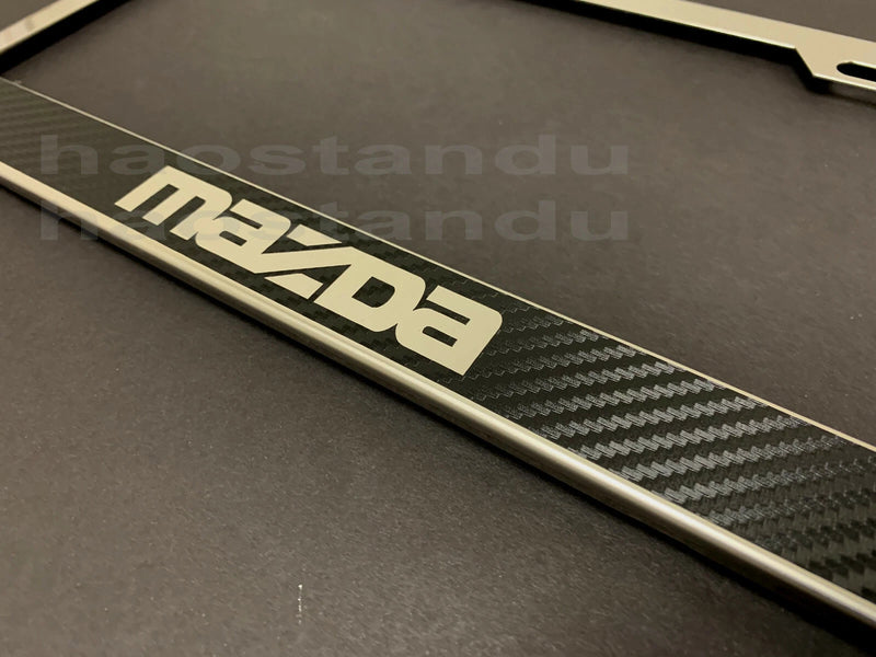 1x MAZDA style STAINLESS STEEL LICENSE PLATE FRAME HOLDER w/(Carbon Fiber Style)