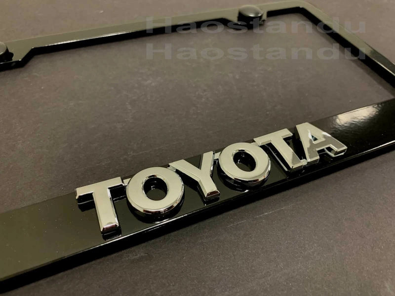 1x Toyota Style 3D Emblem BLACK Stainless License Plate Frame RUST FREE+S.Caps (L)