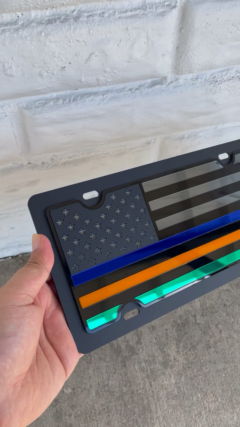 Thin Lines License Plate- Blue, Orange and Green Bars on Blacked Out USA Flag